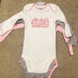 Brand new long sleeve onesie